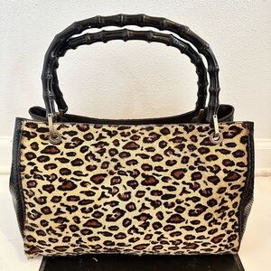 Adrienne Vittanna FUR/ SNAKE bag. All use bags are 40 to 70% off, includ…